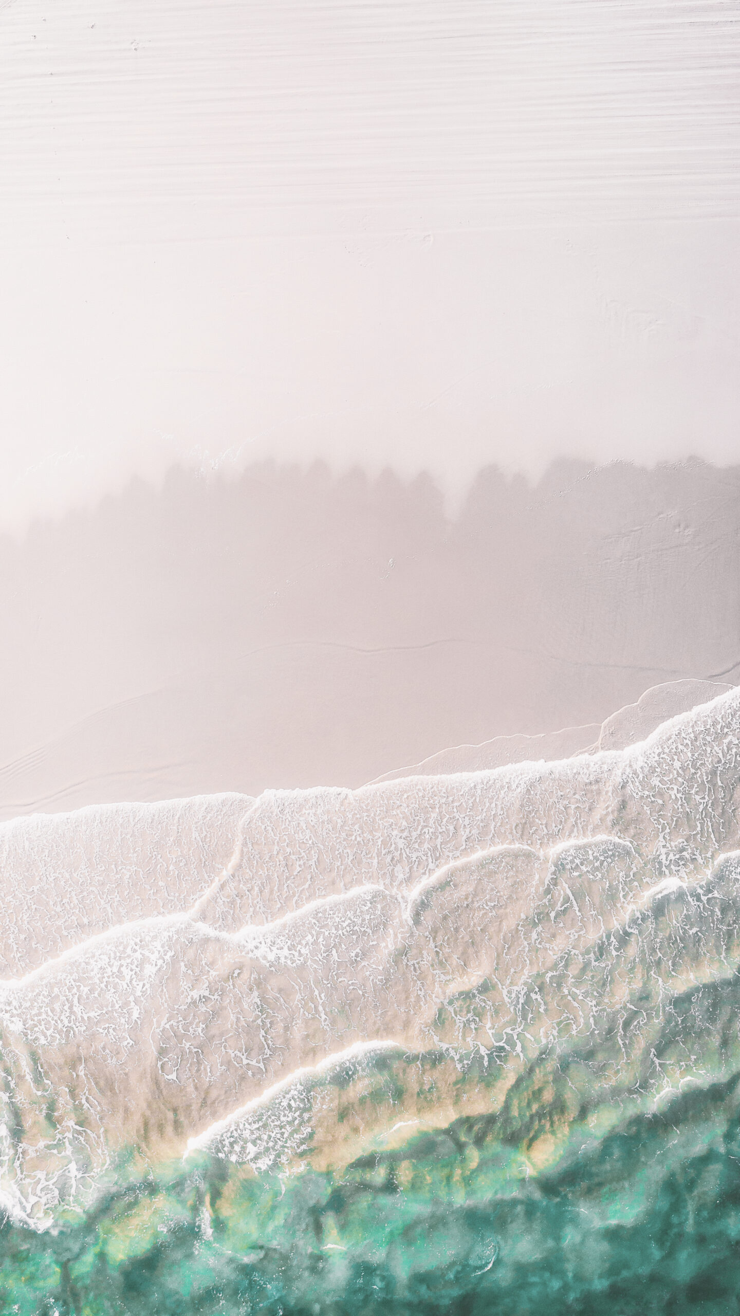 White sand beach mobile phone wallpaper drone shot